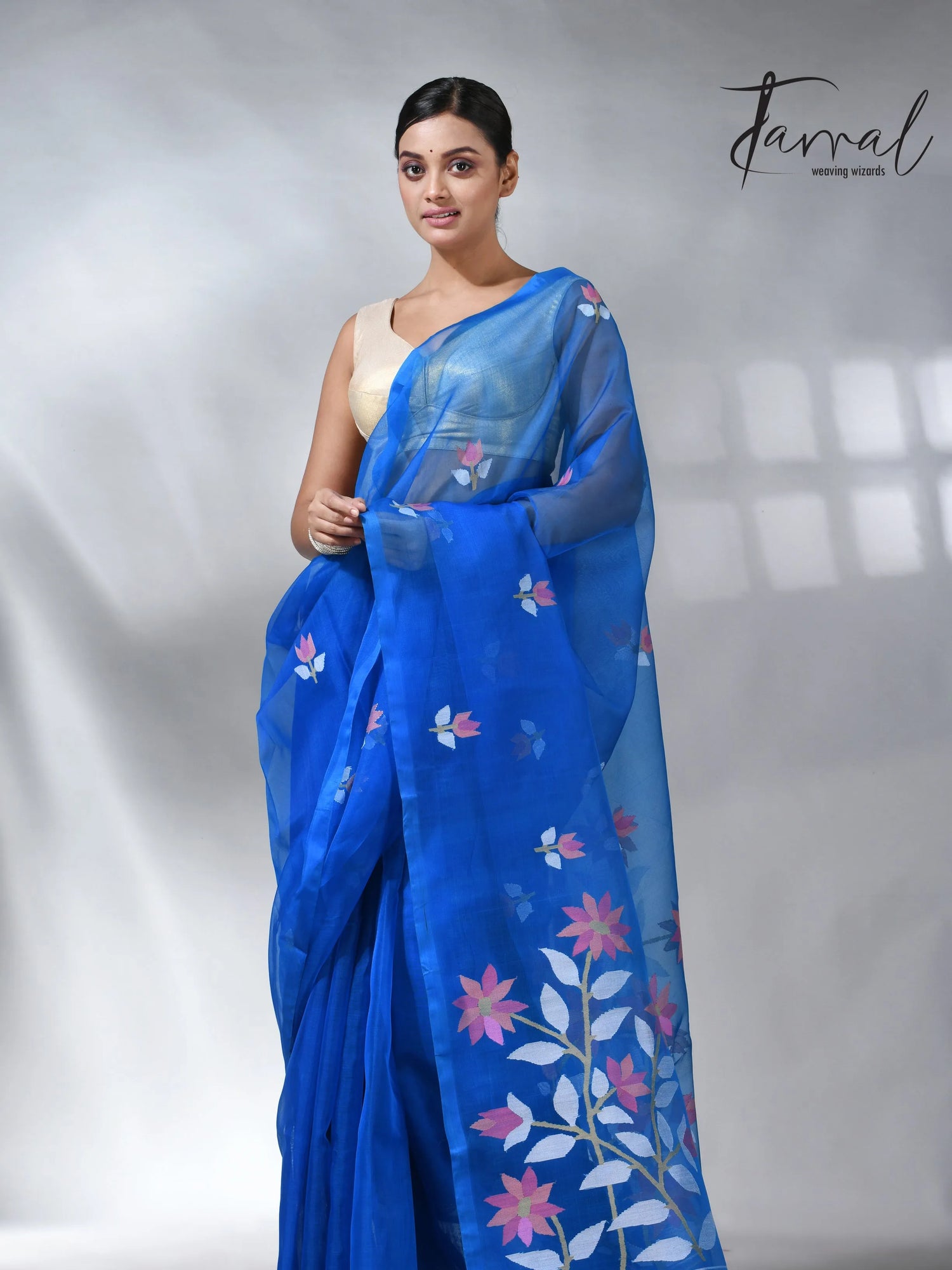 Sea blue colour in floral muslin silk handwoven jamdani saree