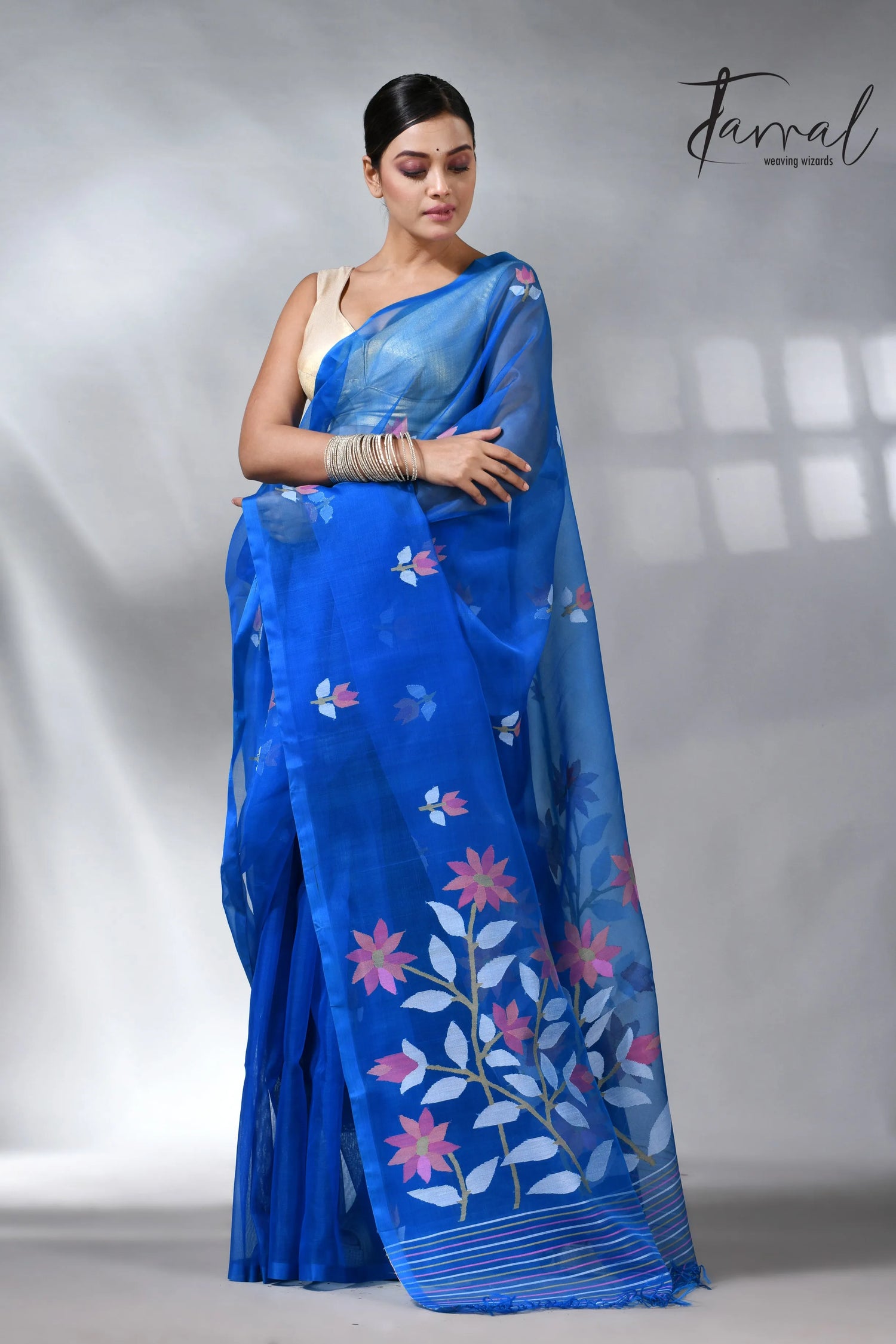Sea blue colour in floral muslin silk handwoven jamdani saree