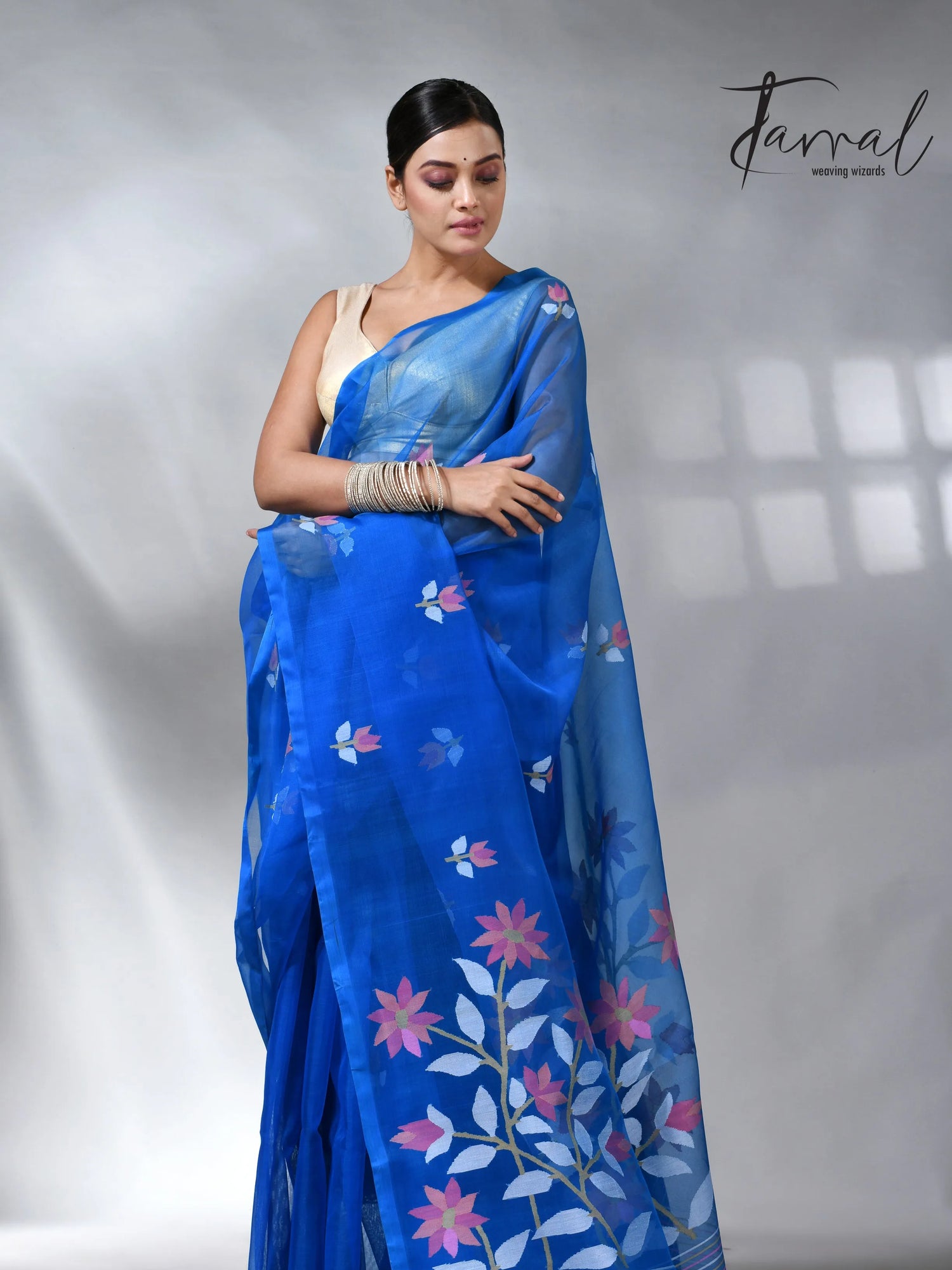 Sea blue colour in floral muslin silk handwoven jamdani saree