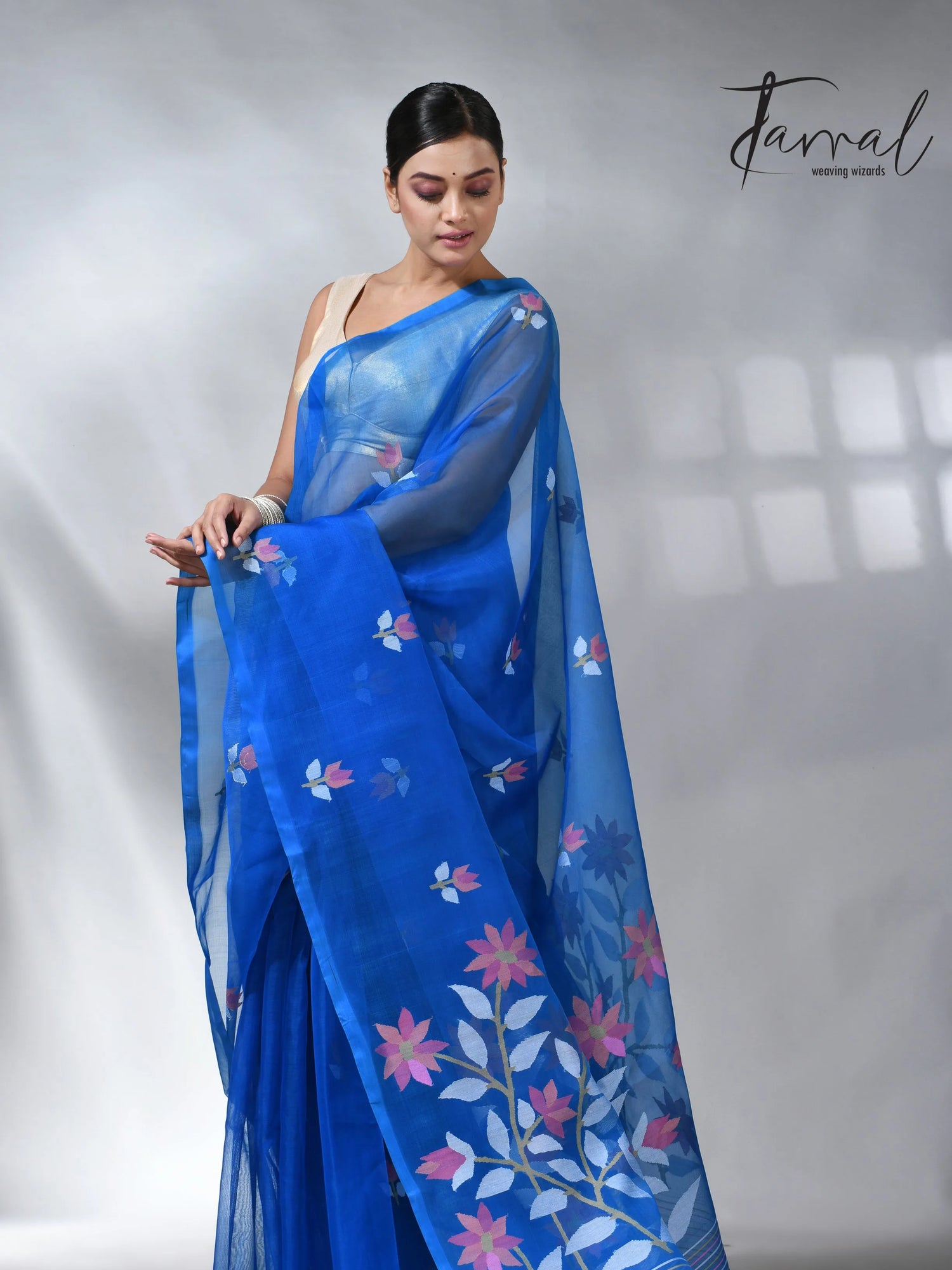 Sea blue colour in floral muslin silk handwoven jamdani saree