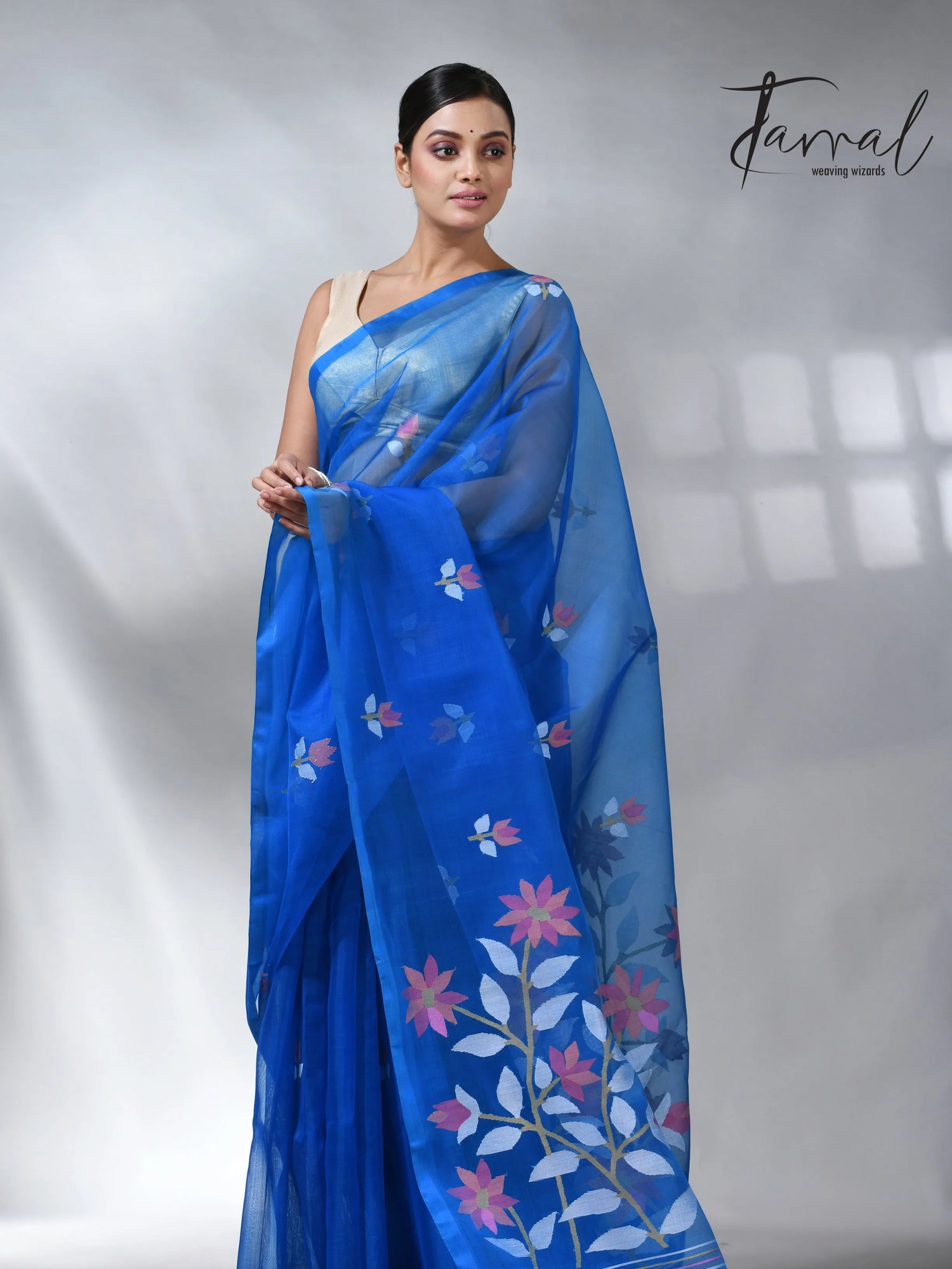 Sea blue colour in floral muslin silk handwoven jamdani saree