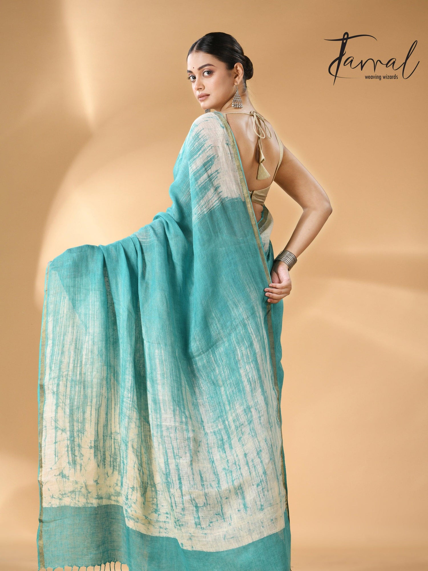 Sea green with white linen handcrafted batik saree back
