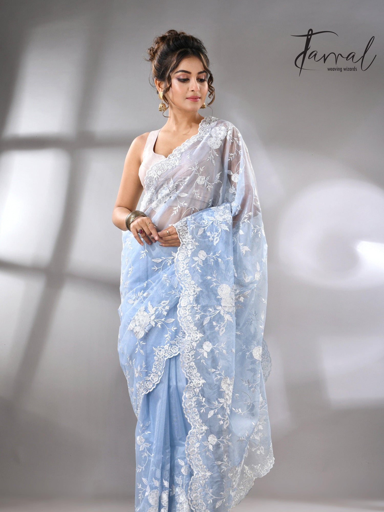 Sky blue organza embroidered handloom saree