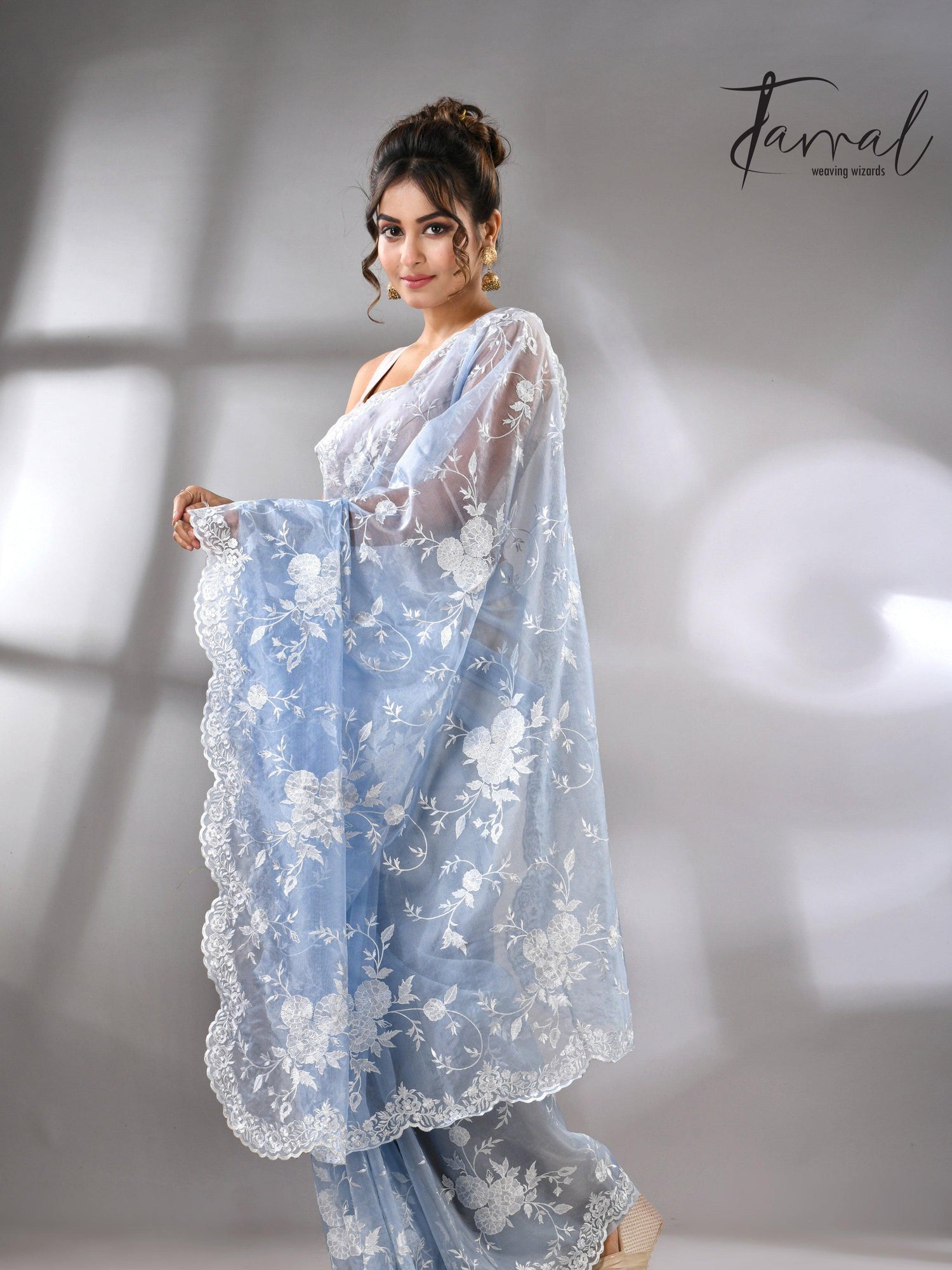 Sky blue organza embroidered handloom saree left1