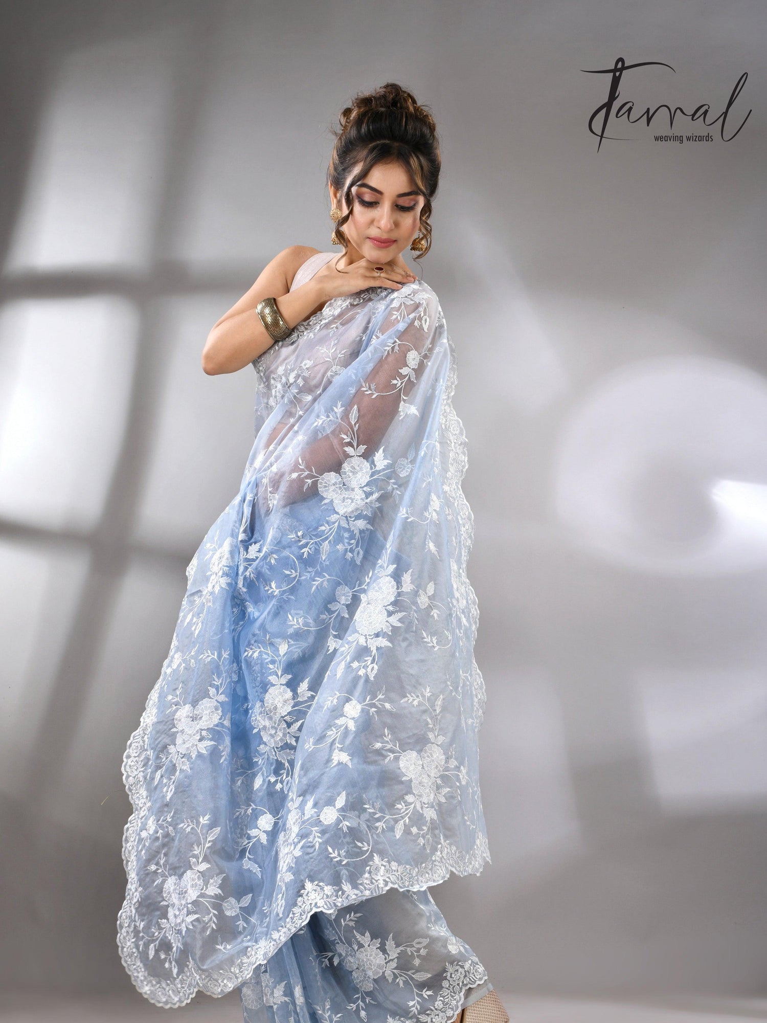 Sky blue organza embroidered handloom saree left2