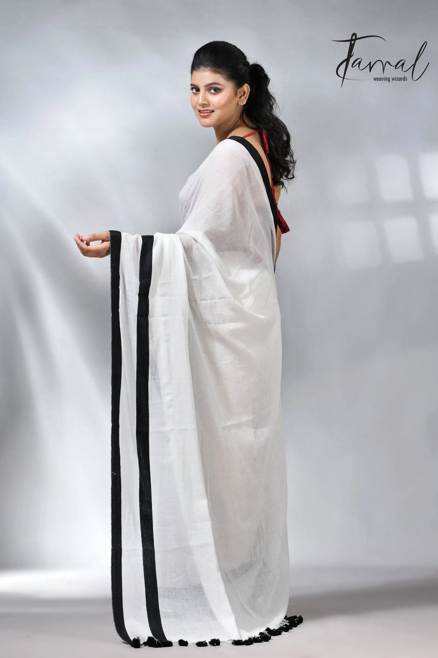 White with black colour border in mul cotton handloom saree