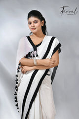White with black colour border in mul cotton handloom saree
