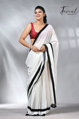 White with black colour border in mul cotton handloom saree