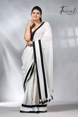 White with black colour border in mul cotton handloom saree