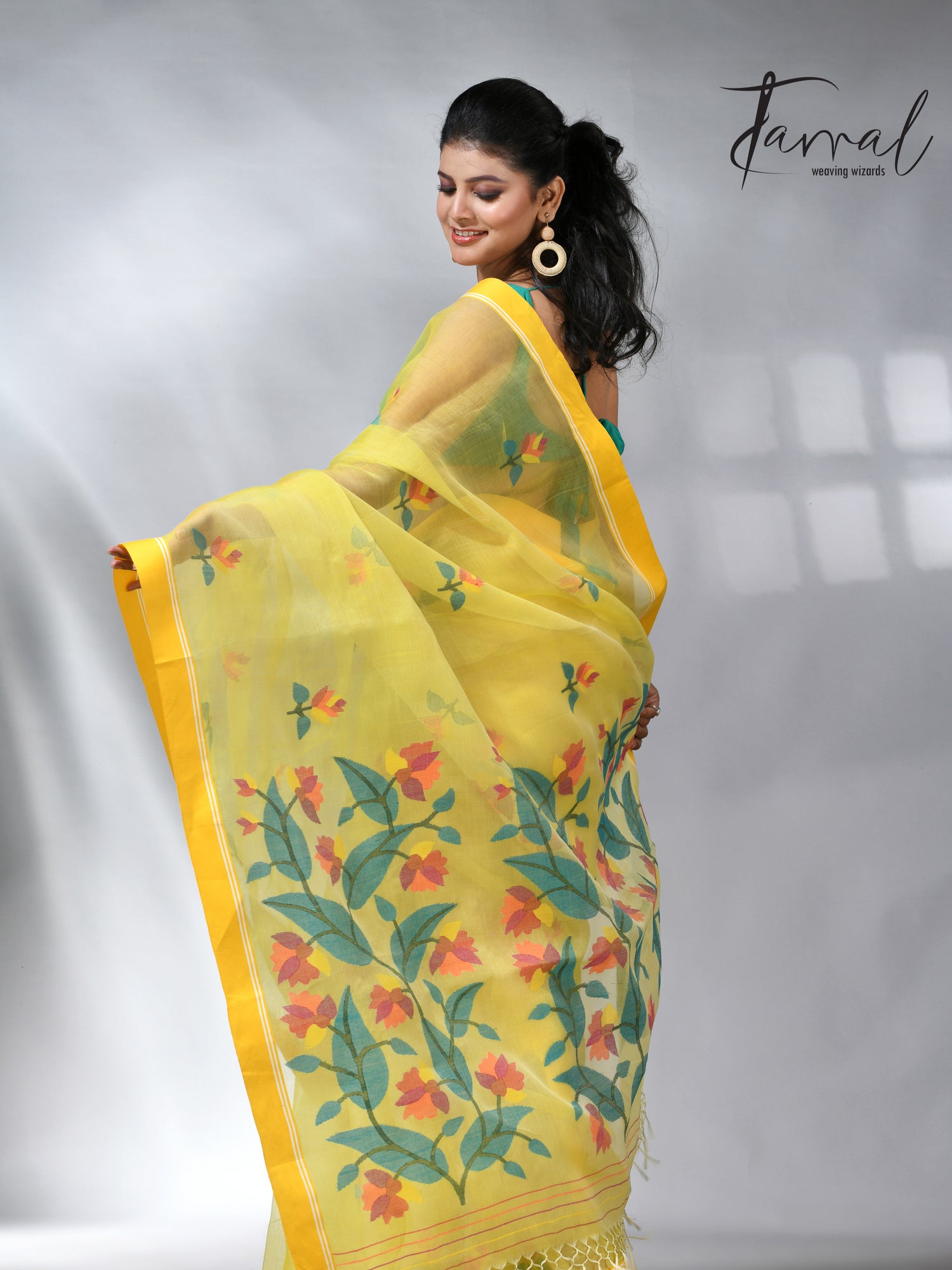Yellow colour muslin silk floral handwoven jamdani saree