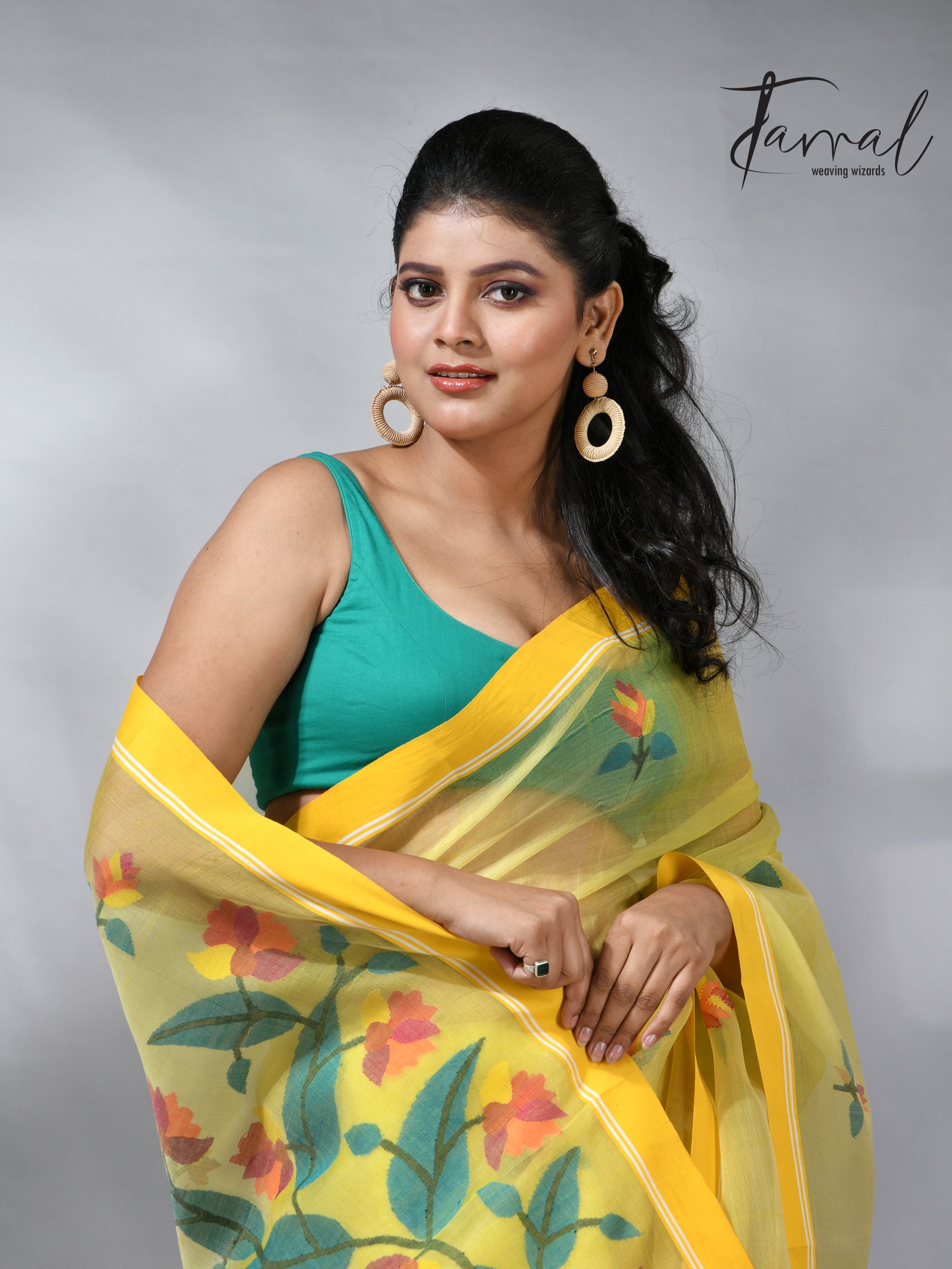 Yellow colour muslin silk floral handwoven jamdani saree