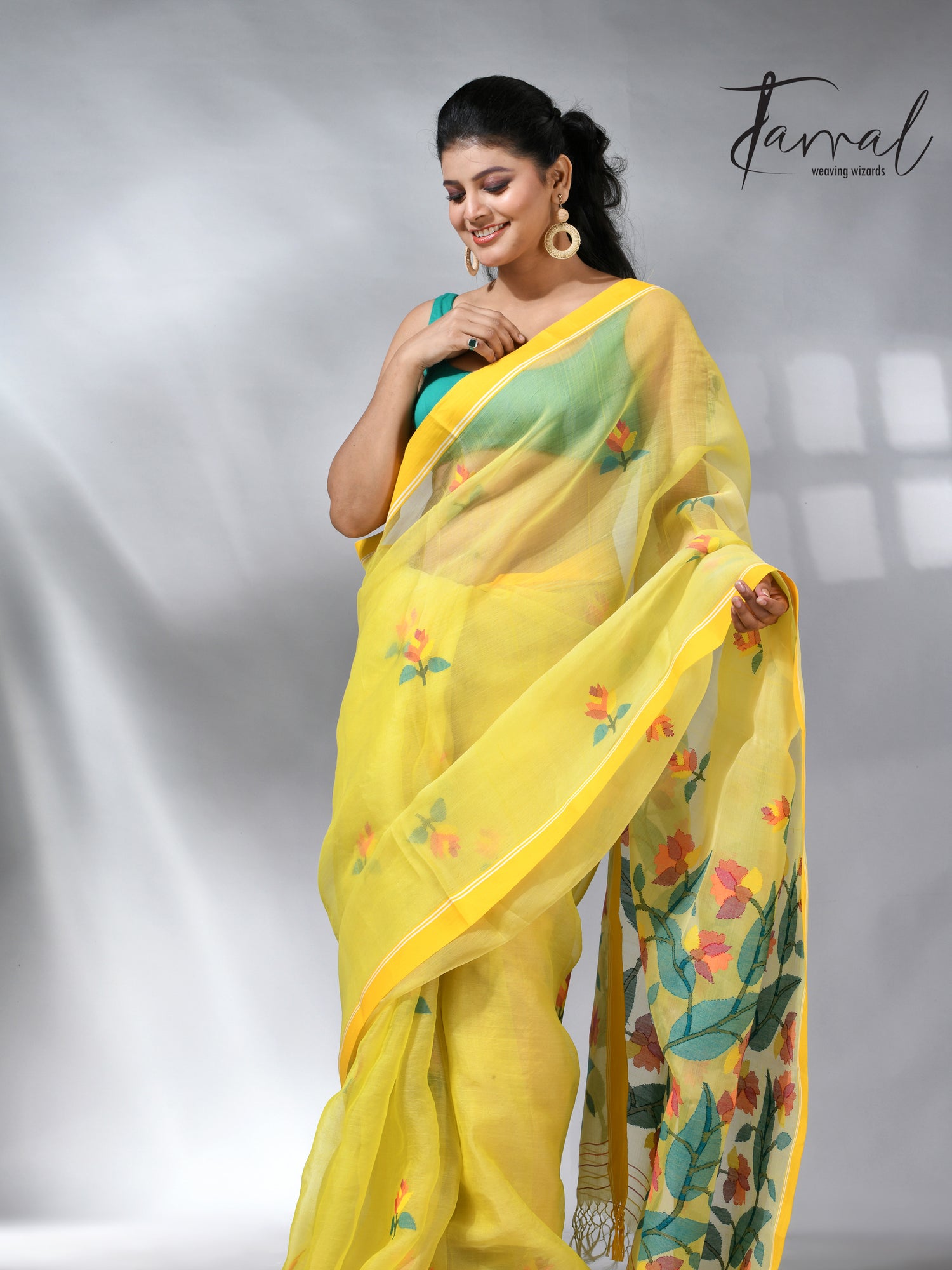Yellow colour muslin silk floral handwoven jamdani saree
