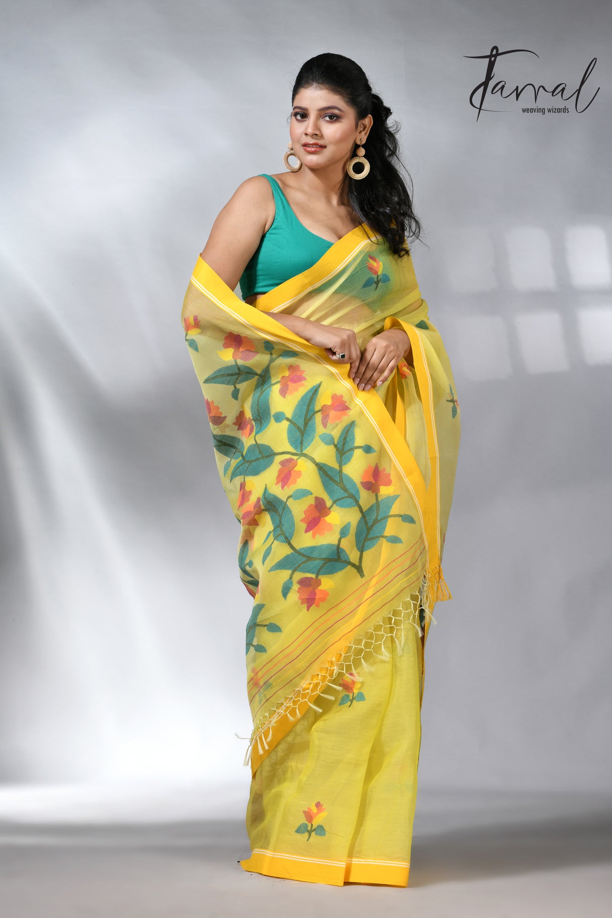 Yellow colour muslin silk floral handwoven jamdani saree