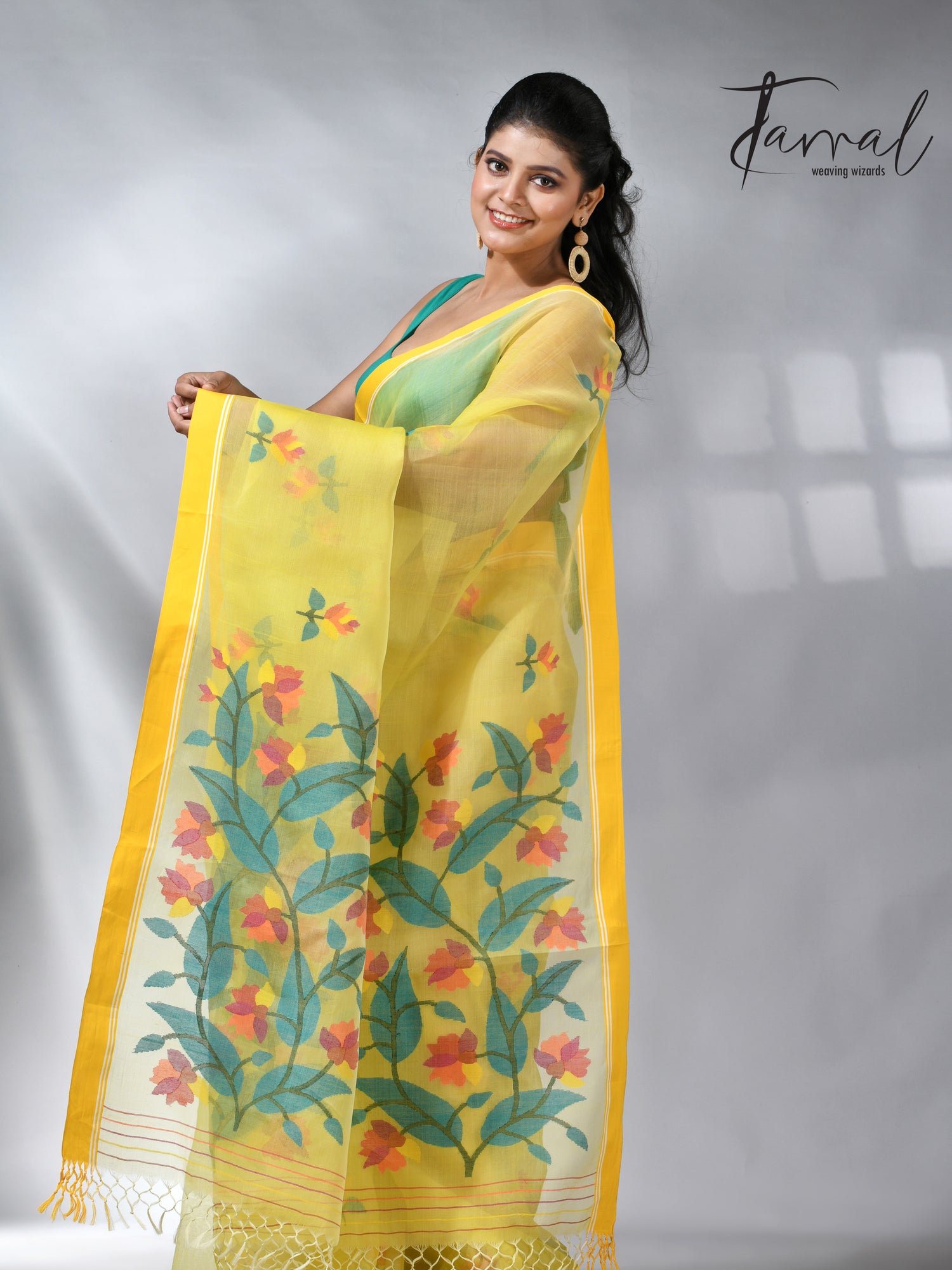 Yellow colour muslin silk floral handwoven jamdani saree