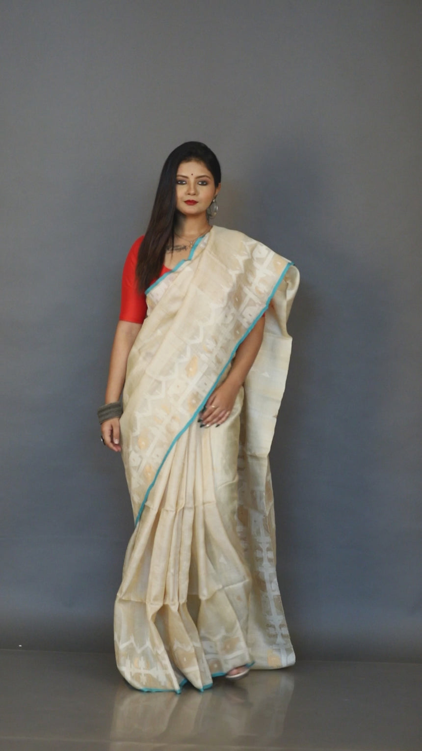 Beige with firoza in handwoven jamdani saree in tusser silk video