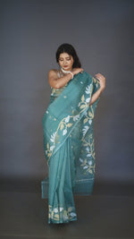 Pine Green Muslin Silk Handwoven Jamdani Saree With Zari Motifs